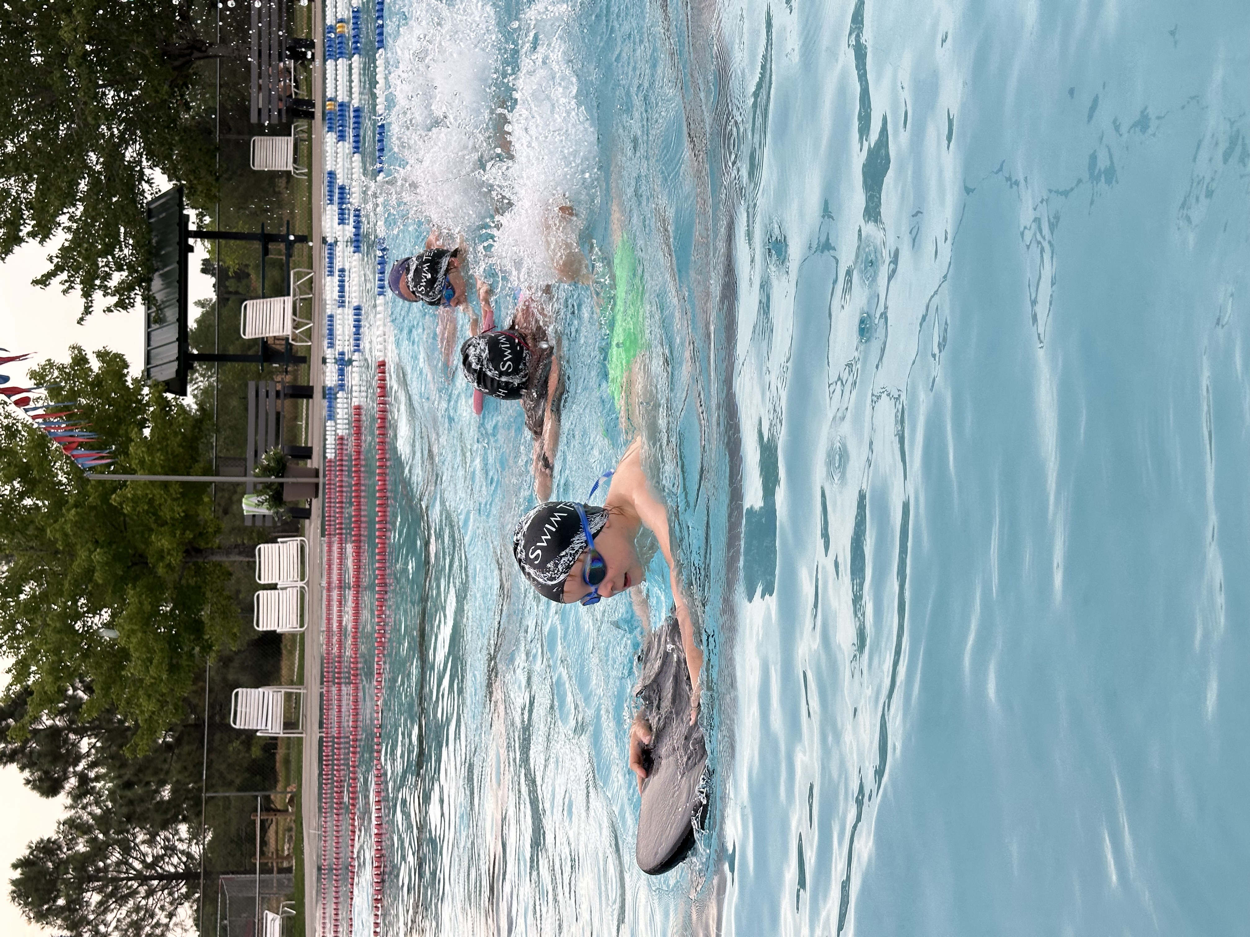 Swimmer practicing kicking technique outdoors